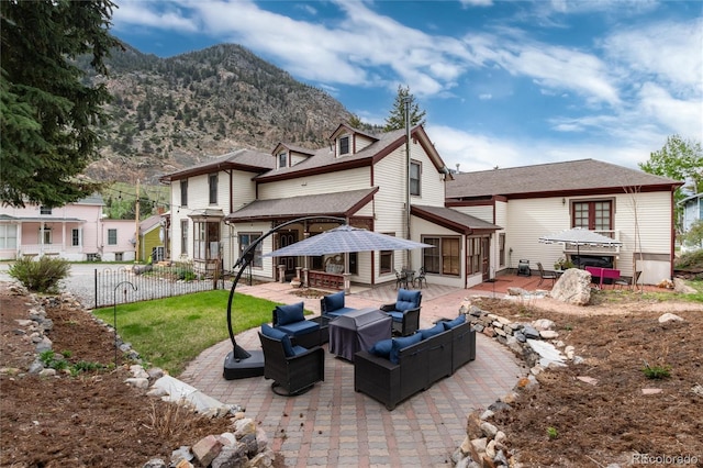 200 Rose St, Georgetown, CO 80444 - rear view of property featuring a patio, outdoor lounge area, and a deck with mountain view