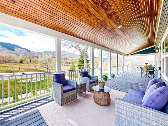 2221 Illinois St, Golden, CO 80401 - sunroom / solarium with a mountain view, an outdoor living space, and vaulted ceiling