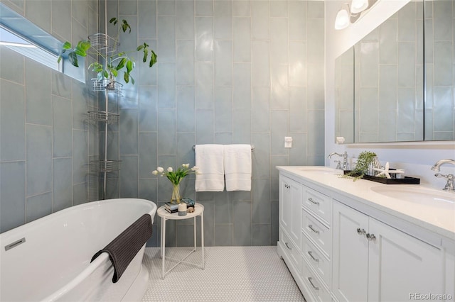 2221 Illinois St, Golden, CO 80401 - full bath with double vanity, a freestanding tub, tile patterned flooring, and tile walls