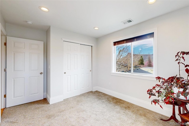 2221 Illinois St, Golden, CO 80401 - unfurnished bedroom featuring carpet flooring, recessed lighting, and a closet