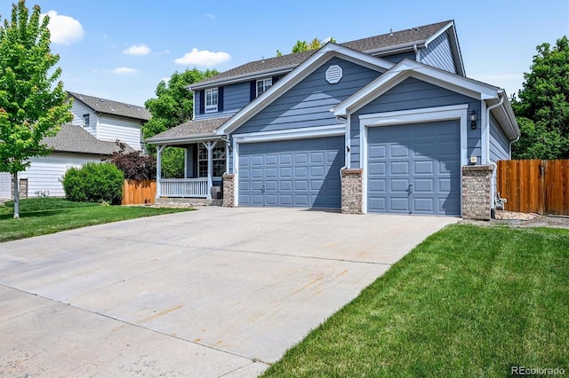 17395 E Dewberry Dr, Parker, CO 80134 - view of front of property featuring an attached garage, driveway, covered porch, and a shingled roof