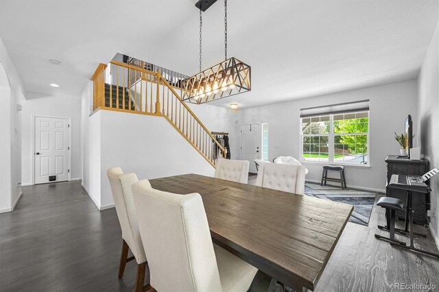 17395 E Dewberry Dr, Parker, CO 80134 - dining area with stairs, dark wood-style flooring, a chandelier, baseboards, and recessed lighting