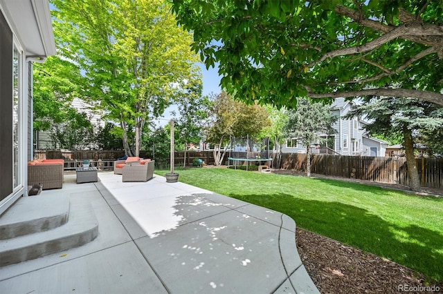 17395 E Dewberry Dr, Parker, CO 80134 - view of patio / terrace with a trampoline and an outdoor hangout area