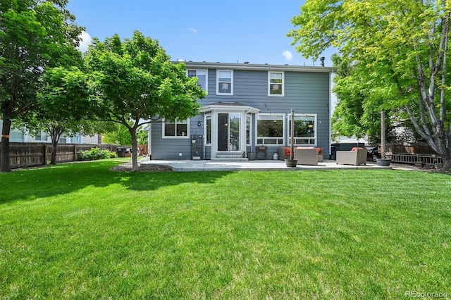 17395 E Dewberry Dr, Parker, CO 80134 - back of property with a patio and an outdoor hangout area