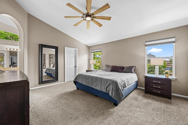 17395 E Dewberry Dr, Parker, CO 80134 - carpeted bedroom with vaulted ceiling, baseboards, and a ceiling fan