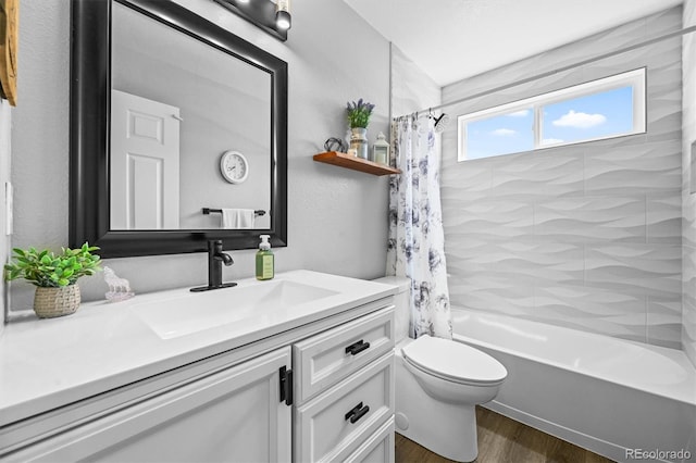 17395 E Dewberry Dr, Parker, CO 80134 - bathroom with wood finished floors, vanity, shower / tub combo, and toilet