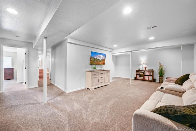 17395 E Dewberry Dr, Parker, CO 80134 - living room with light carpet, baseboards, recessed lighting, and a textured ceiling