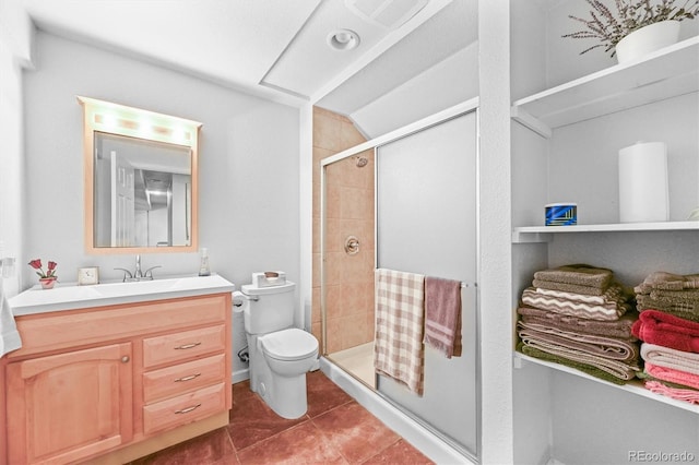 17395 E Dewberry Dr, Parker, CO 80134 - full bath with toilet, vanity, a shower stall, and tile patterned flooring