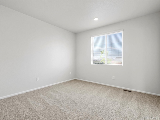 1023 Odessa Lake Rd, Severance, CO 80550 - empty room with carpet flooring and recessed lighting