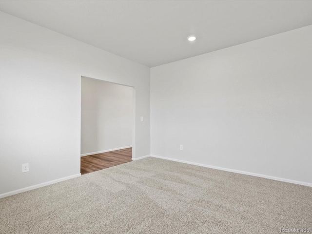 1023 Odessa Lake Rd, Severance, CO 80550 - empty room with carpet flooring and recessed lighting