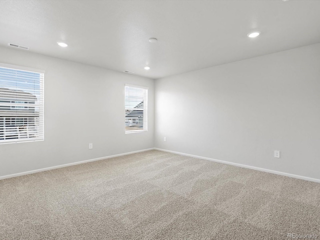 1023 Odessa Lake Rd, Severance, CO 80550 - carpeted spare room with plenty of natural light and recessed lighting