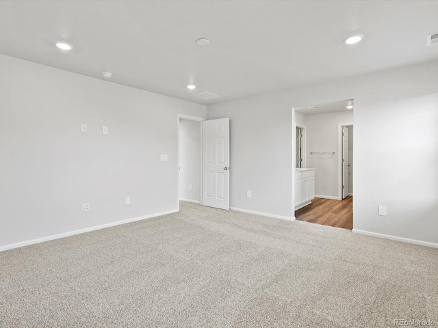 1023 Odessa Lake Rd, Severance, CO 80550 - carpeted spare room with baseboards and recessed lighting