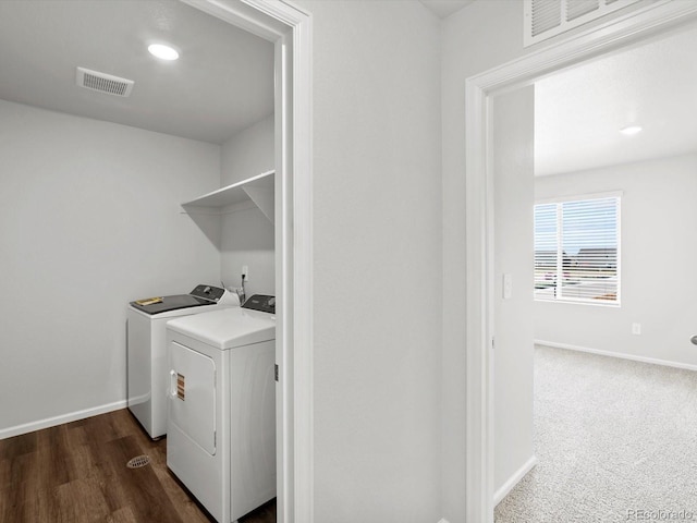 1023 Odessa Lake Rd, Severance, CO 80550 - laundry area with washer and clothes dryer, recessed lighting, and dark wood-type flooring