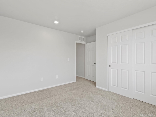 1023 Odessa Lake Rd, Severance, CO 80550 - unfurnished bedroom featuring carpet flooring, a closet, and recessed lighting