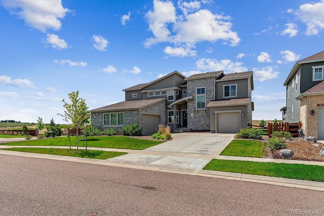 8299 S Kellerman, Aurora, CO 80016 - prairie-style house featuring driveway, an attached garage, and stone siding