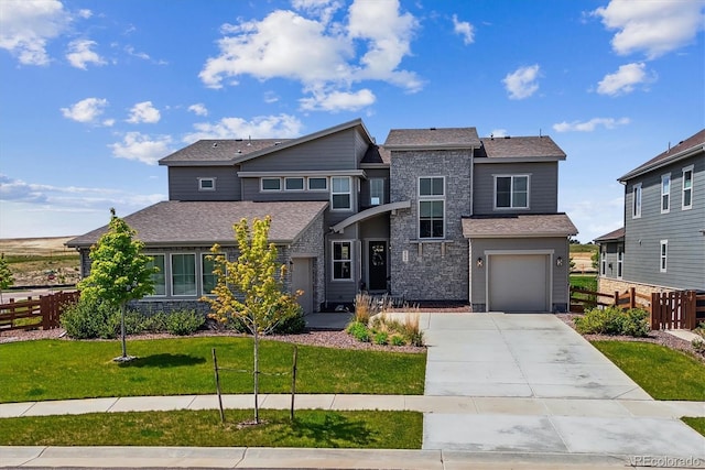 8299 S Kellerman, Aurora, CO 80016 - view of front of house with concrete driveway, a garage, and a shingled roof