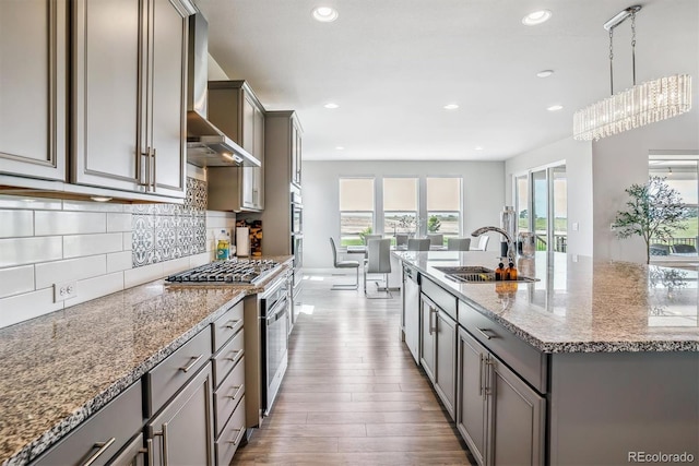 8299 S Kellerman, Aurora, CO 80016 - kitchen featuring a sink, gray cabinets, appliances with stainless steel finishes, and recessed lighting