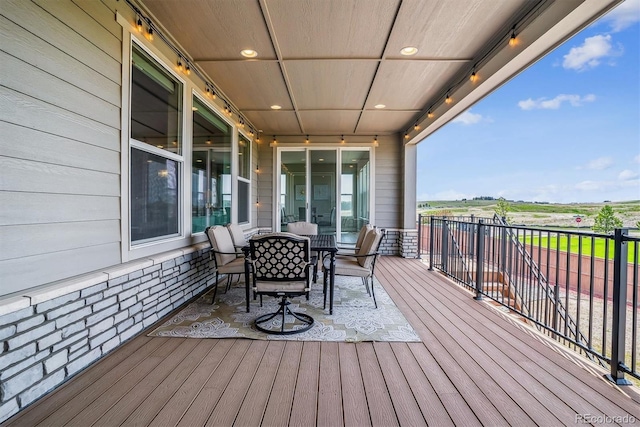 8299 S Kellerman, Aurora, CO 80016 - wooden terrace featuring outdoor dining space