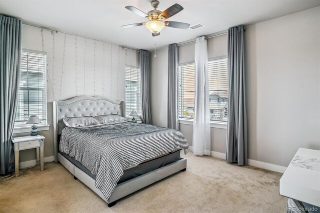 8299 S Kellerman, Aurora, CO 80016 - bedroom with light colored carpet, baseboards, and ceiling fan