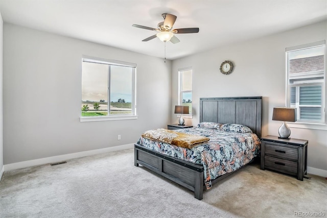 8299 S Kellerman, Aurora, CO 80016 - bedroom featuring multiple windows, baseboards, and carpet floors