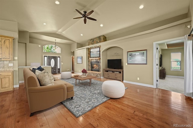 1743 Homestead Dr, Fort Lupton, CO 80621 - living area with hardwood / wood-style flooring, ceiling fan, vaulted ceiling, and baseboards