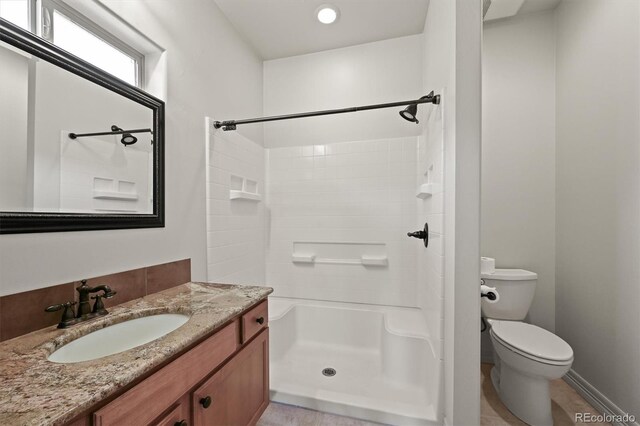 1743 Homestead Dr, Fort Lupton, CO 80621 - full bath with toilet, a shower, and vanity