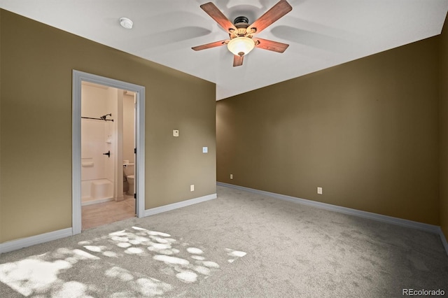 1743 Homestead Dr, Fort Lupton, CO 80621 - unfurnished bedroom with light colored carpet, baseboards, ensuite bath, and ceiling fan