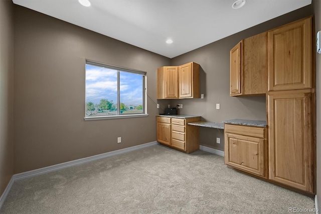 1743 Homestead Dr, Fort Lupton, CO 80621 - kitchen featuring light colored carpet, baseboards, and recessed lighting