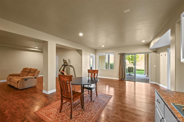1743 Homestead Dr, Fort Lupton, CO 80621 - dining space with baseboards, wood finished floors, and recessed lighting