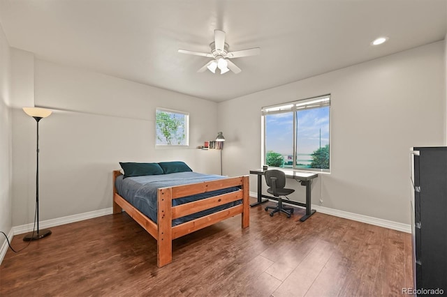 1743 Homestead Dr, Fort Lupton, CO 80621 - bedroom featuring baseboards, wood finished floors, an office area, ceiling fan, and recessed lighting