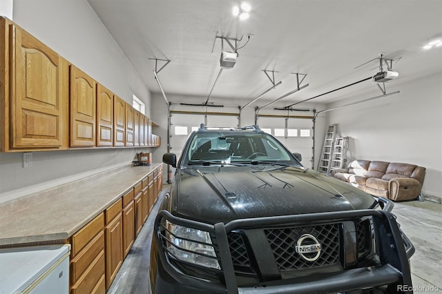 1743 Homestead Dr, Fort Lupton, CO 80621 - garage with a garage door opener