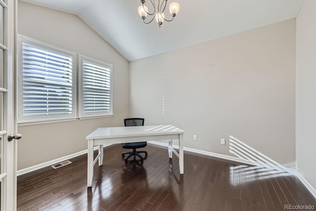 office area featuring lofted ceiling, dark hardwood / wood-style floors, and a chandelier