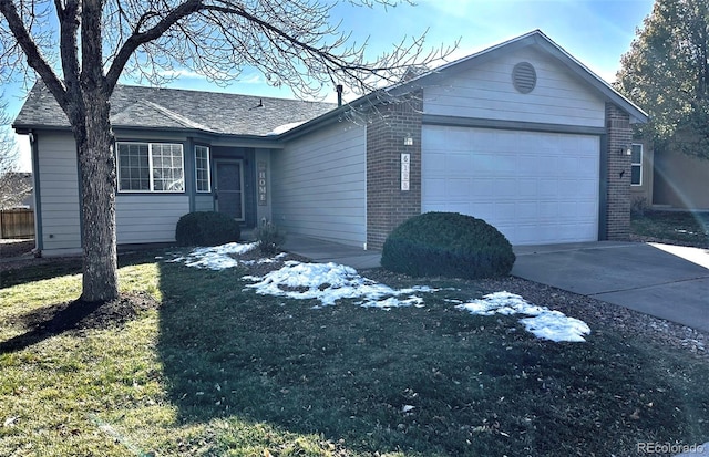 single story home with a garage