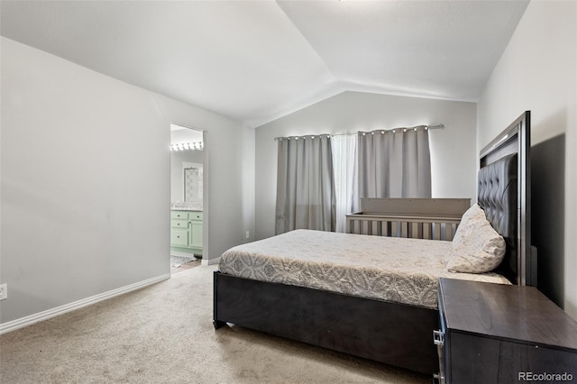 2211 S Moline Ct, Aurora, CO 80014 - carpeted bedroom featuring lofted ceiling and ensuite bathroom
