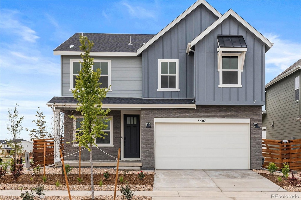 view of front of property featuring a garage