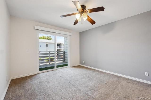 3141 S Tamarac Dr Unit 206E, Denver, CO 80231 - carpeted spare room with ceiling fan and baseboards