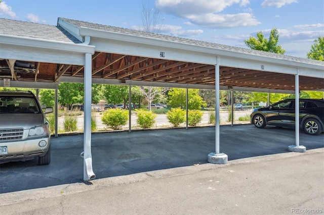 3141 S Tamarac Dr Unit 206E, Denver, CO 80231 - view of covered parking lot