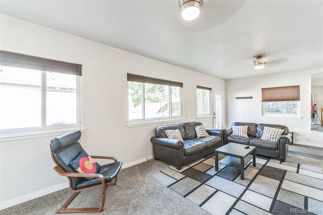3241 Sheridan Blvd, Wheat Ridge, CO 80212 - living room featuring baseboards and light carpet