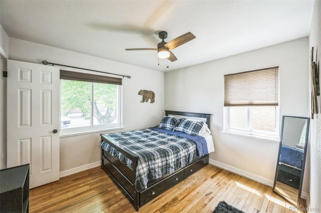 3241 Sheridan Blvd, Wheat Ridge, CO 80212 - bedroom with hardwood / wood-style flooring, baseboards, and ceiling fan