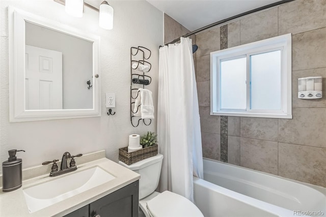 3241 Sheridan Blvd, Wheat Ridge, CO 80212 - full bath featuring vanity, toilet, and shower / tub combo