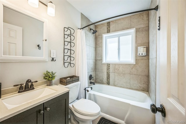 3241 Sheridan Blvd, Wheat Ridge, CO 80212 - bathroom featuring toilet, vanity, and shower / bath combo with shower curtain