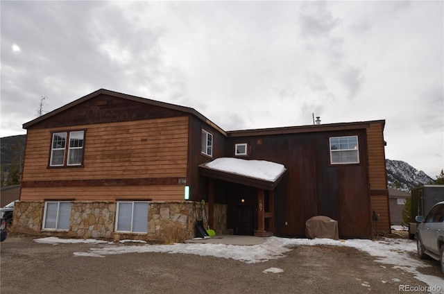 view of front of house with stone siding