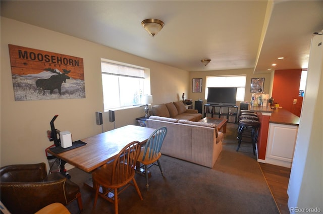 dining room featuring dark wood-style flooring and recessed lighting