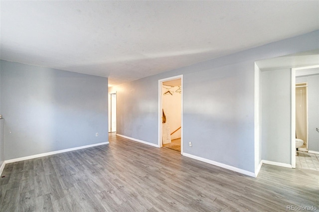 empty room featuring hardwood / wood-style flooring