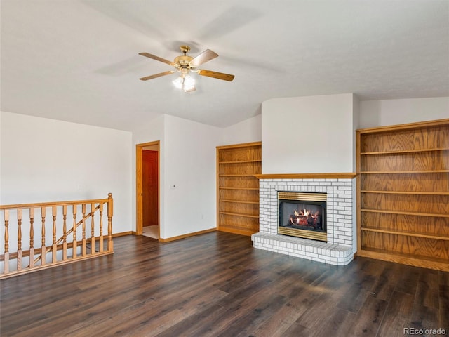 living room featuring ceiling fan, lofted ceiling, and dark wood-type flooring