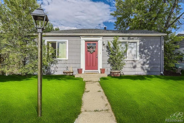 view of front of house with a front yard