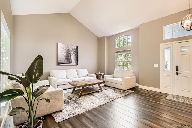 9545 Grand Cypress Cv, Lone Tree, CO 80124 - living room featuring high vaulted ceiling and dark wood finished floors