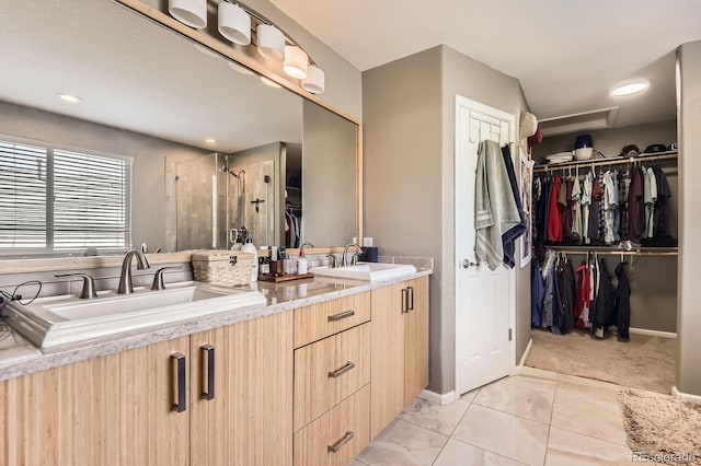 9545 Grand Cypress Cv, Lone Tree, CO 80124 - bathroom with a stall shower, double vanity, and a walk in closet