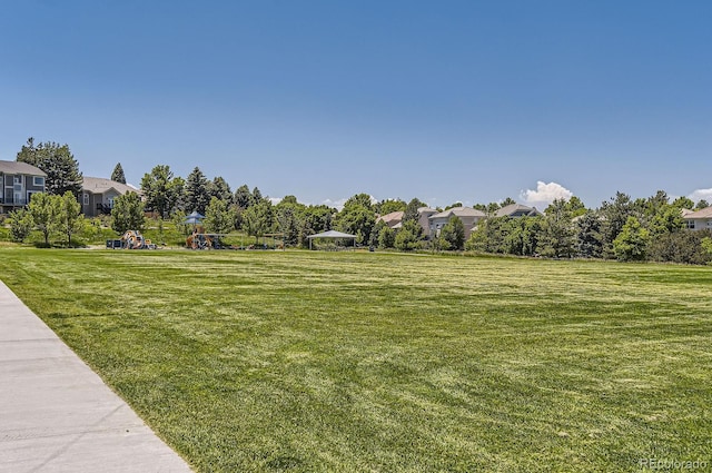 9545 Grand Cypress Cv, Lone Tree, CO 80124 - view of green lawn featuring a residential view