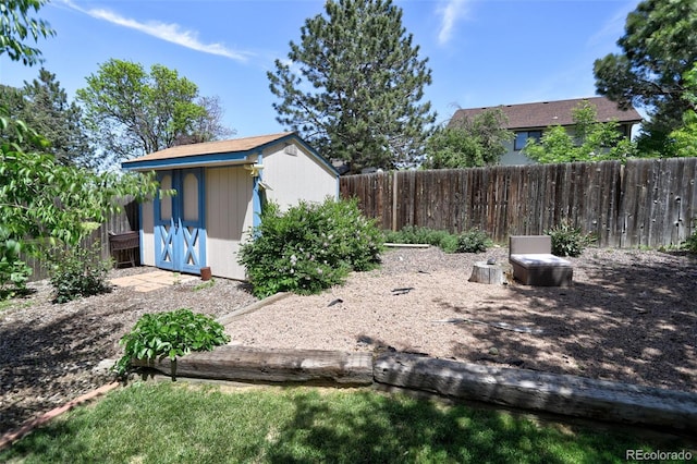 view of yard with a storage shed